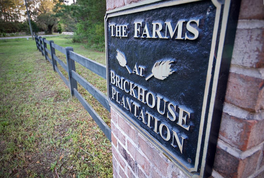 Farms at Brickhouse Plantation sign on brick pillar at entrance (copy)